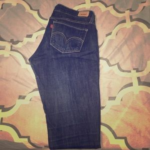 New pair of dark wash Levi jeans